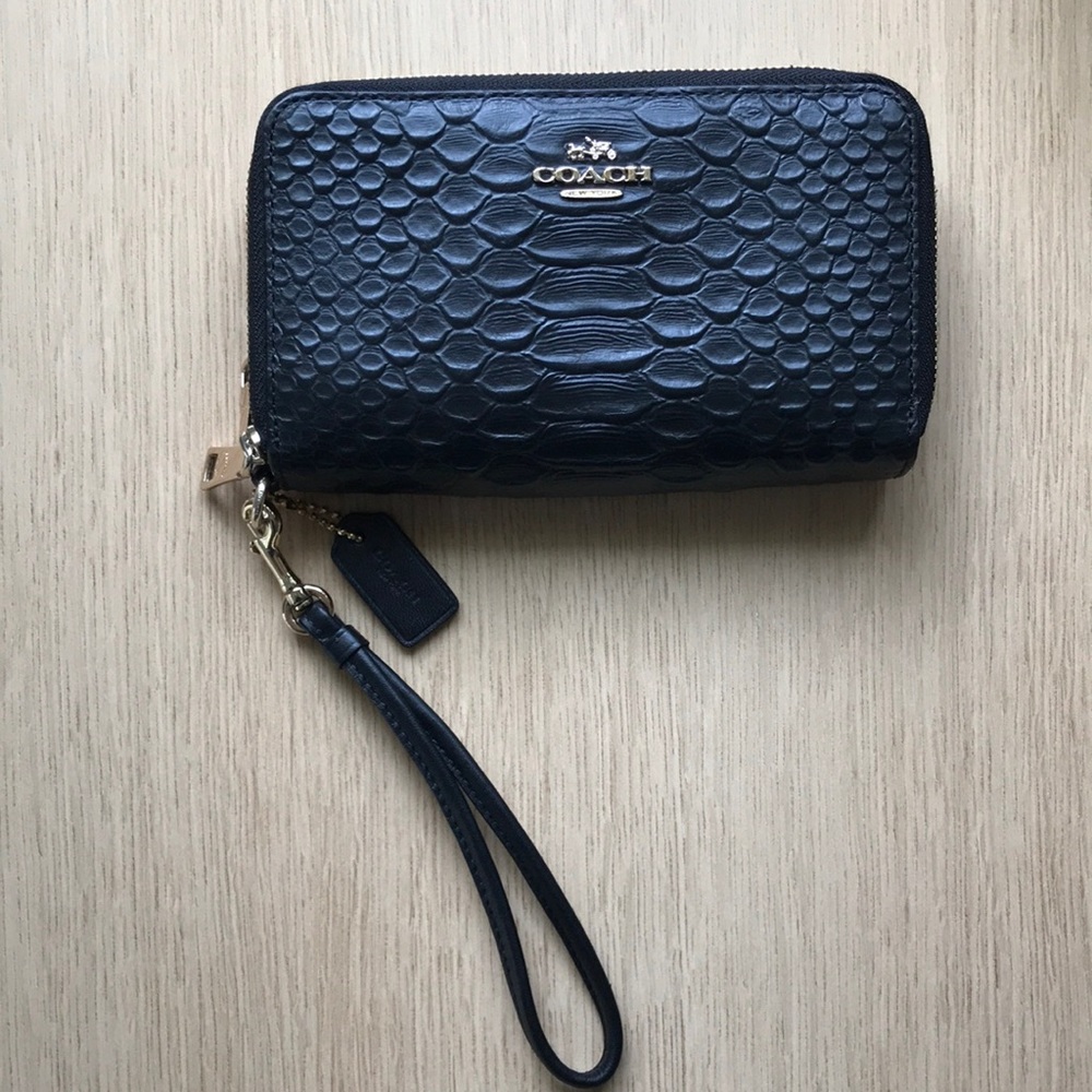 BRAND NEW COACH CLUTCH - black leather and gold. Unused!